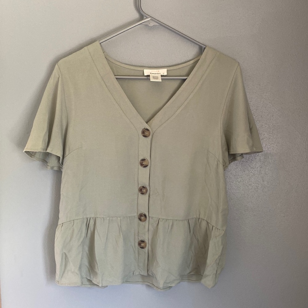 Green ruffly shirt